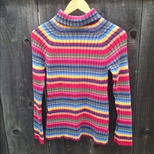 This is a thrifted rainbow long sleeve turtleneck
